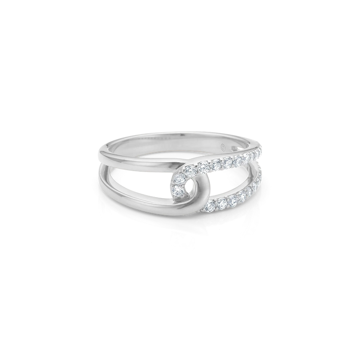 Silver ring with shiny surface and curved shape, decorated with clear stones, front view