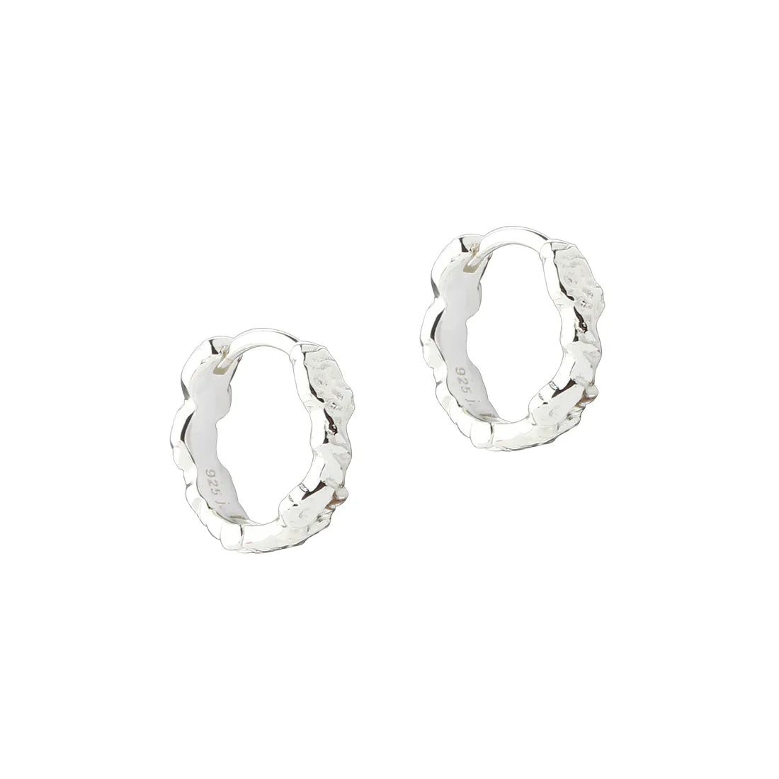 Silver earrings with organic wavy design, front view of two creoles