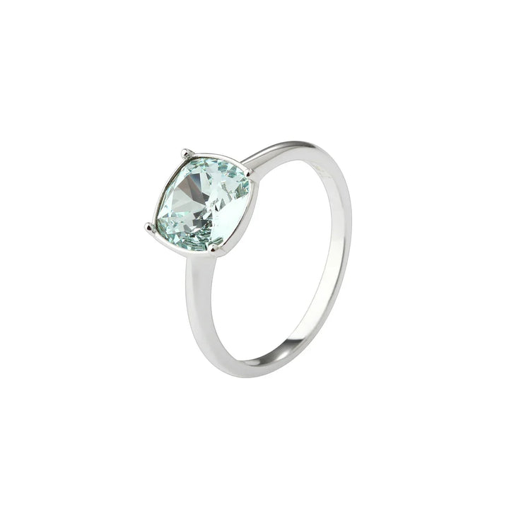 Silver ring with large triangular light blue stone, front view against white background
