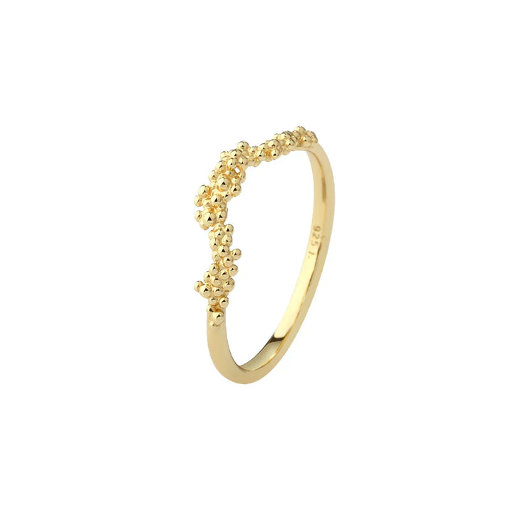 Gold ring with small ball details, front view, elegant and stylish design