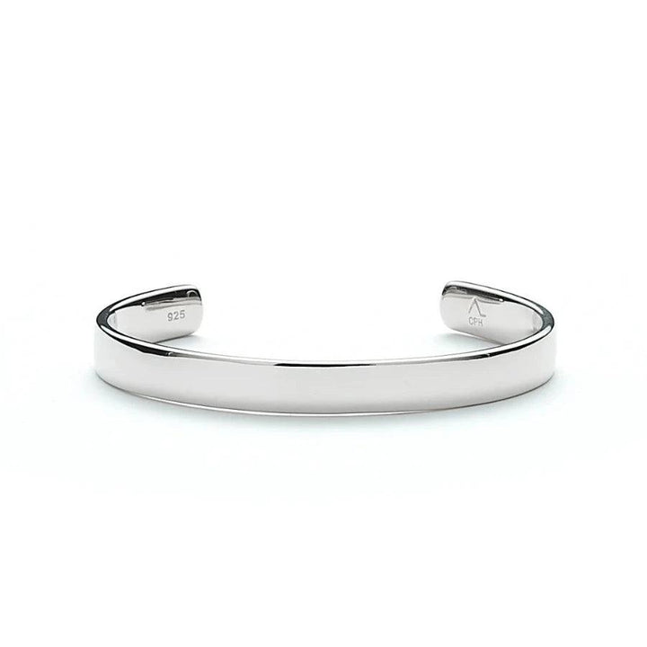 Alexander Lyngaard Hope Bangle in silver shows a stylish, polished bangle in 925 sterling silver. Model h20013-003-1