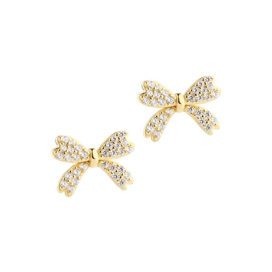 Aqua Dulce Big Darling Bow earrings gold-plated with clear stone details, shaped like bows. Model 5805-1