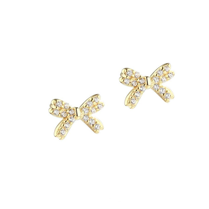 Aqua Dulce Darling Bow earrings gold-plated with clear stones in bow shape, Model 5698-1.