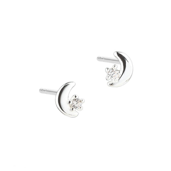 Aqua Dulce Darling Moon earrings in silver, small half moon and star motifs. Model 5687-1.