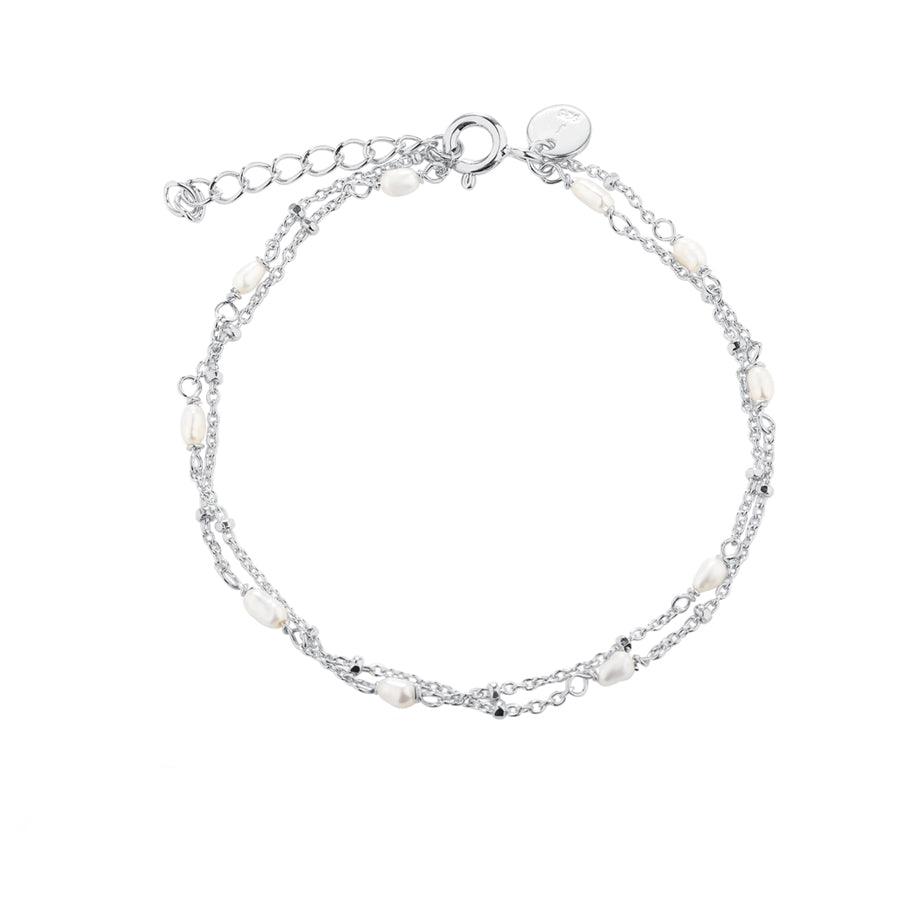 Aqua Dulce Rice Dot Double Bracelet with double silver chains and small white pearls. Model 5371-5371-1