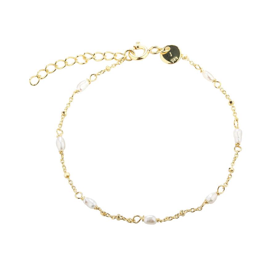 Aqua Dulce Rice Dot Single Bracelet in gold-plated silver with small white pearls, elegant and simple design. Model 5370-5370-1