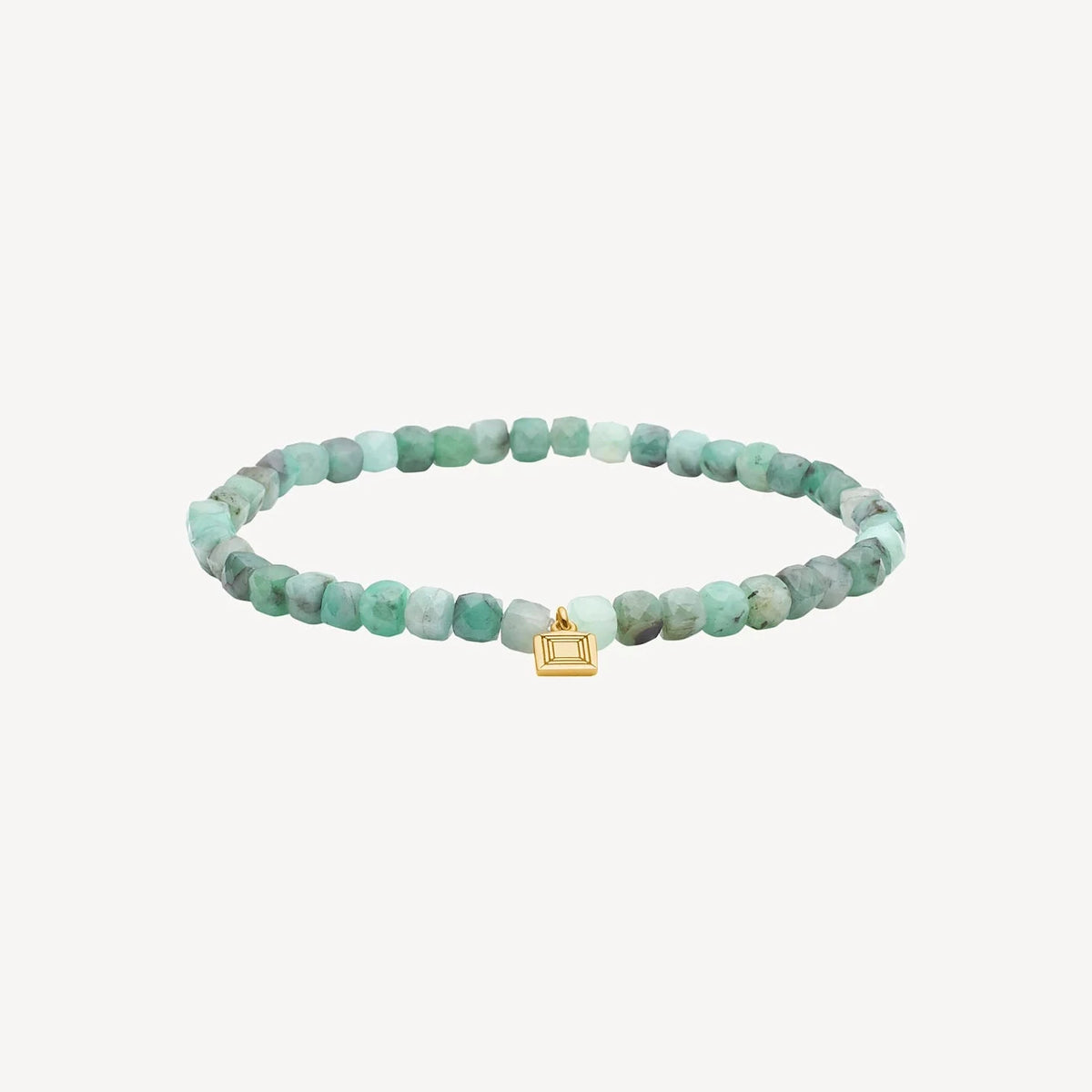Carre Mono Bracelet with emerald gold-plated, green faceted pearls and small golden charm. Model fb4595em-1