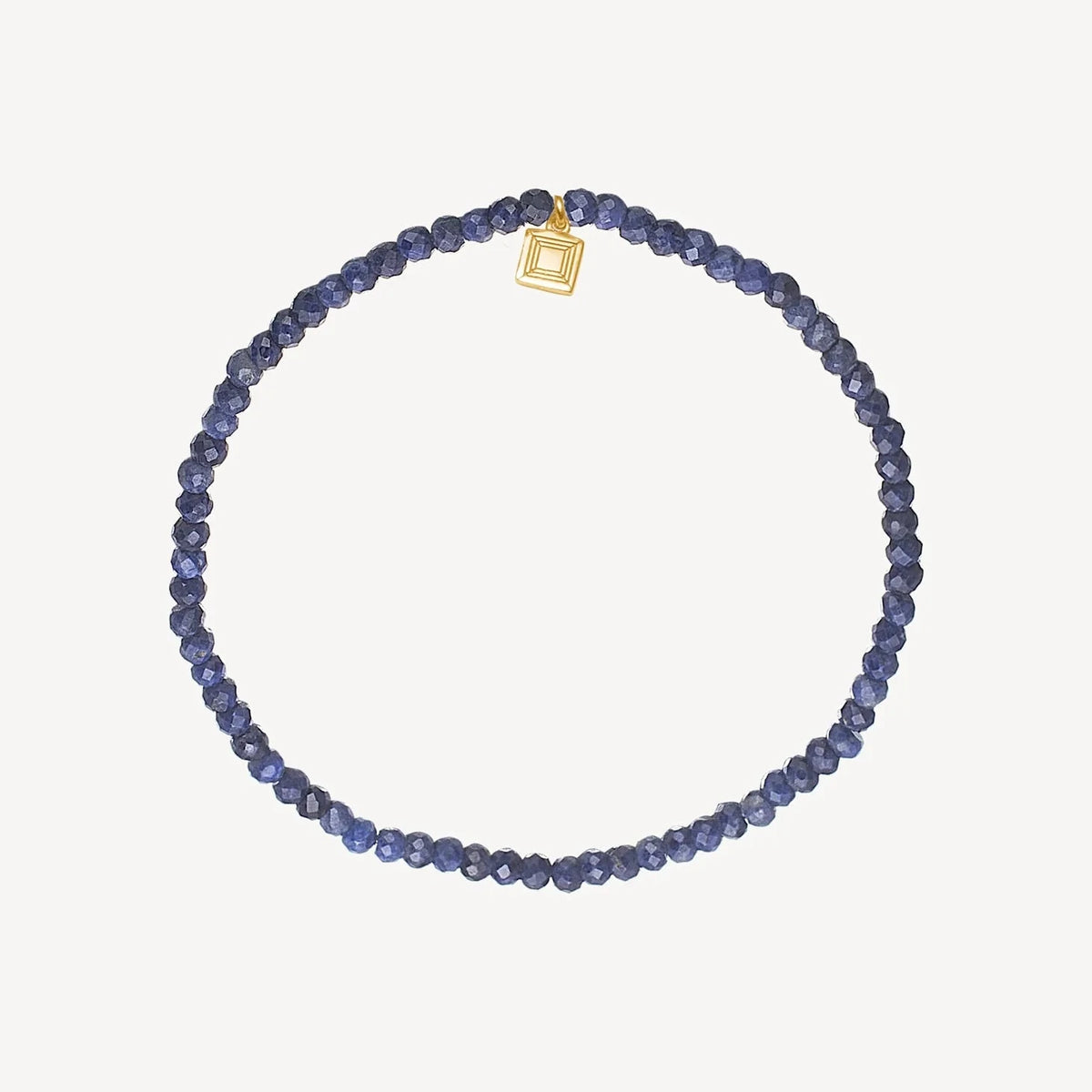 carre savannah bracelet with sapphire gold-plated, round blue sapphire beads and small gold-plated detail. Model fb4541sa-1
