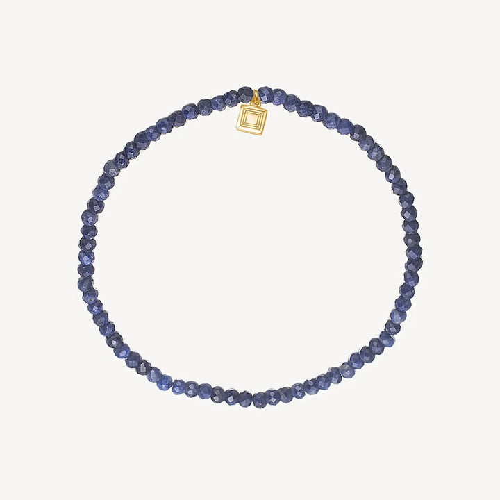 carre savannah bracelet with sapphire gold-plated, round blue sapphire beads and small gold-plated detail. Model fb4541sa-1