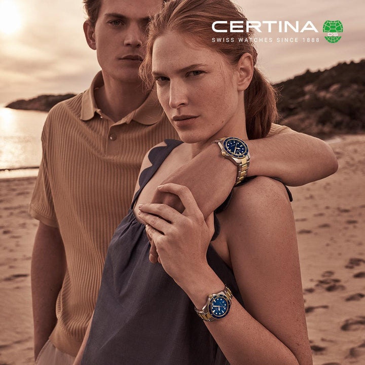 Certina DS Action blue dial PVD 40mm Quartz C0484102204100 shown on woman's hand, beach background, Model C0484102204100.