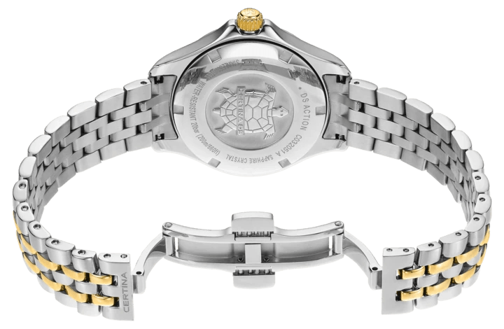 Certina DS Action Lady Diamonds shows the back of the steel case with gold crown and two-tone chain. Model C0320512212601