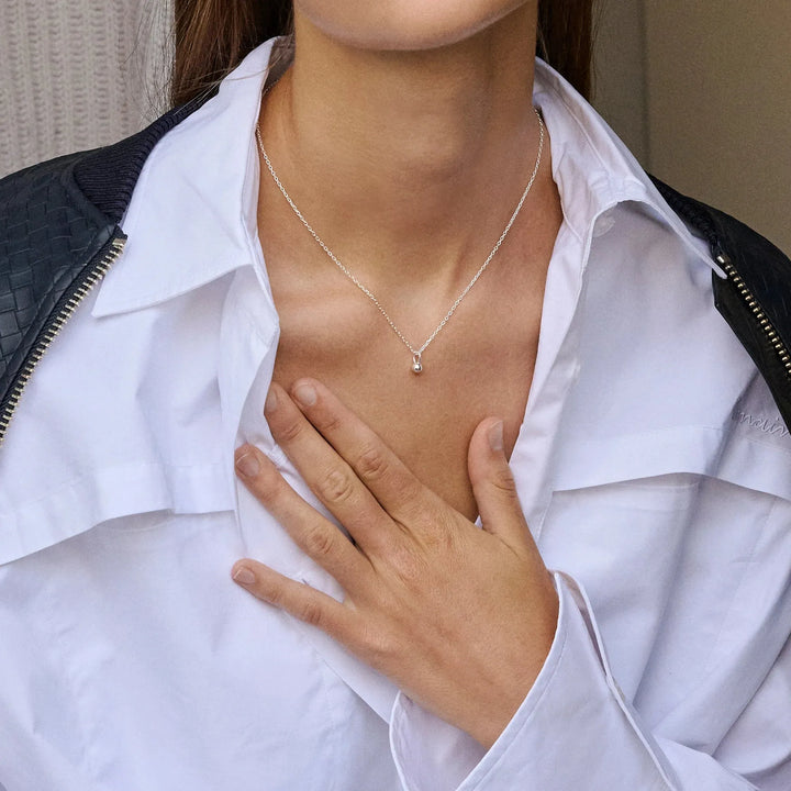 enamel balloon silver necklace with pendant worn by woman wearing white shirt, Model n133s-1