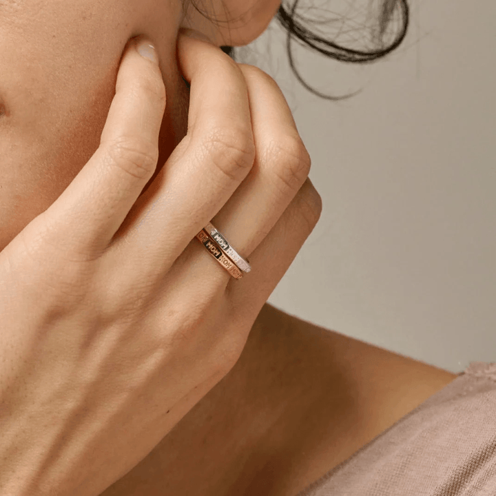 enamel mom gold plated ring appears on woman's hand, elegant and golden detail. ModelR86G-R86G-001-2