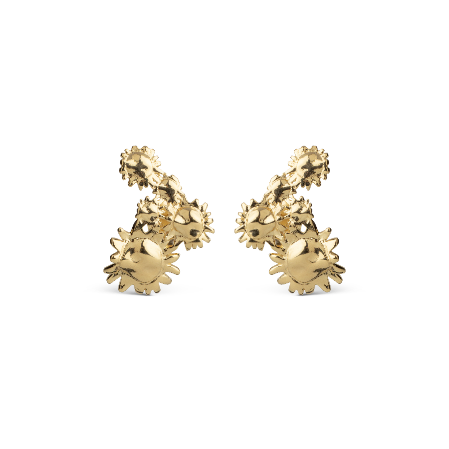 enamel sunshine field stud e417g-1 shows shiny golden studs with sun shaped details, Model e417g-1