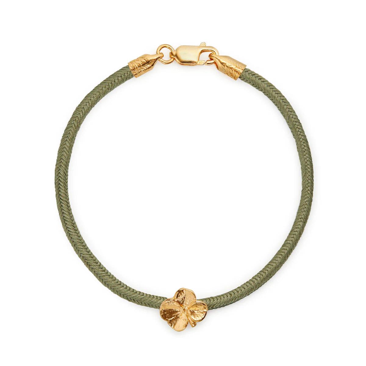 Flora Danica Four Leaf Clover Silk Bracelet Olive Gilt shows olive green silk cord bracelet with gold leaf clover detail, Model 907-flc-silk-olive-g-001-1.