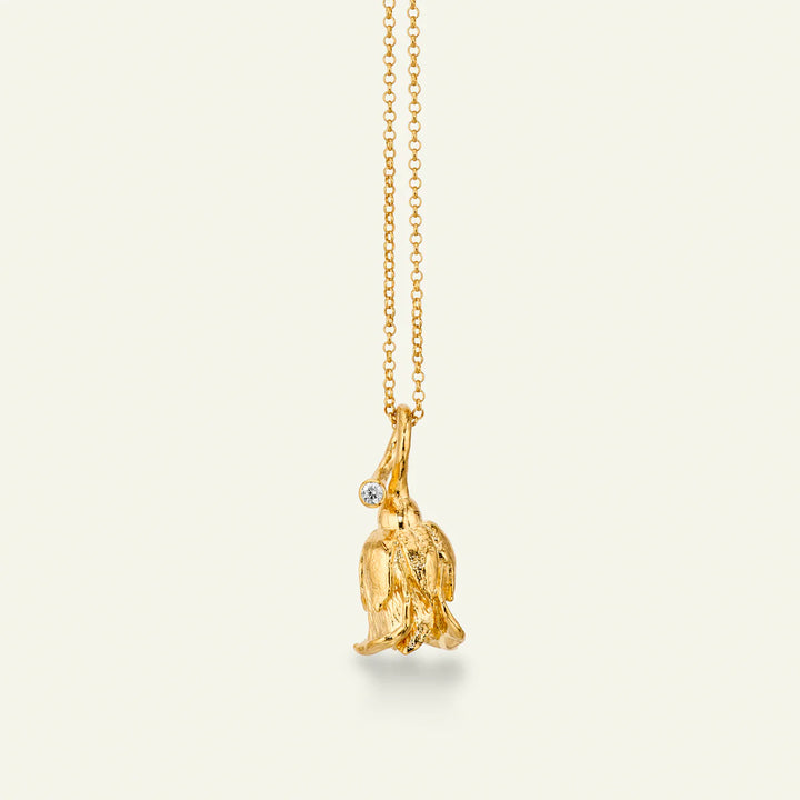 Flora Danica Rose Necklace with Diamond shows a detailed rose in a gold-plated look with a clear stone. Model g-2