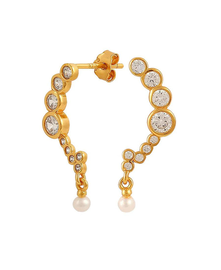 Hultquist copenhagen harper gold-plated earrings feature curved hoops with clear stones and gold-look pearl pendants. Model S08604G-2