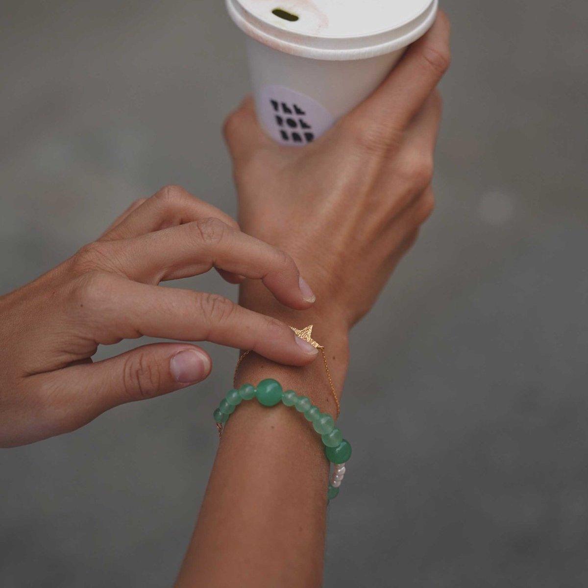 Hultquist Copenhagen Mia Green Pearl Bracelet with matte green pearls on the wrist, Model S08535G-1