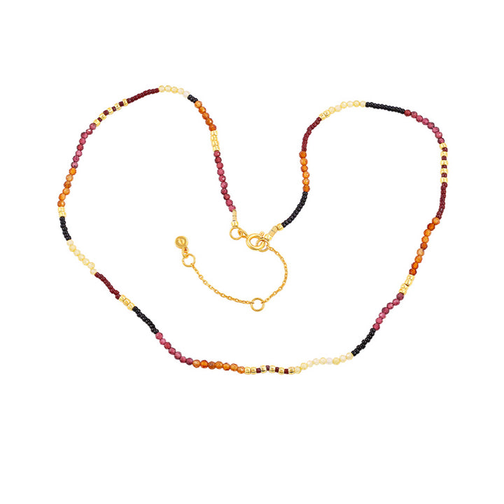 Hultquist Rowen necklace with small colored pearls and gold-plated details, Model S08642G-1.