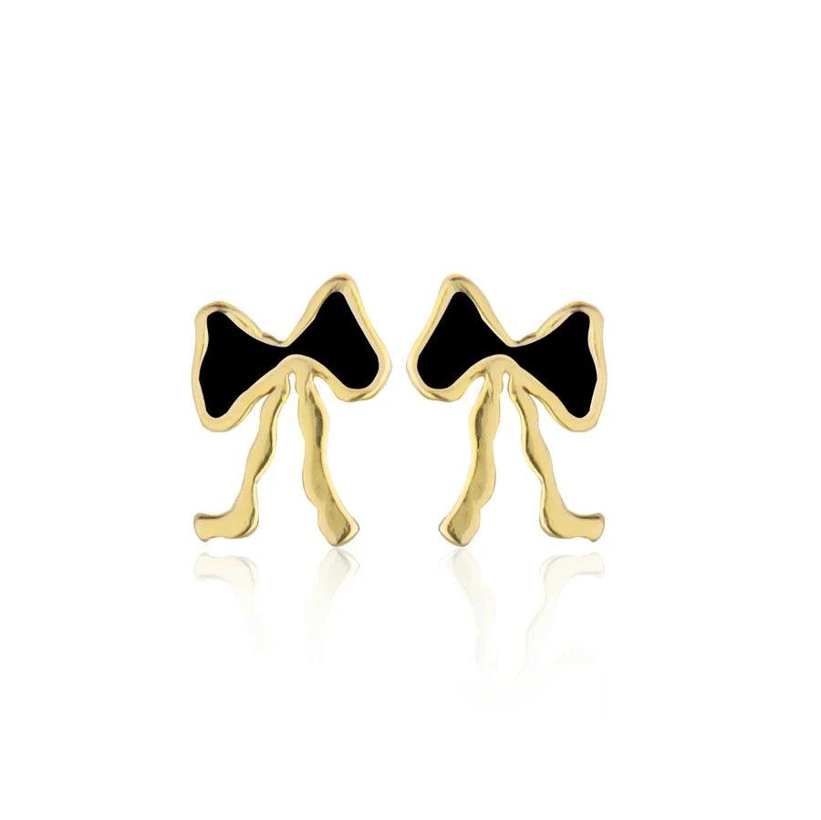 jeberg-petite-bow-black-stud-bow-studs shows a pair of small bow studs in black and gold colored metal. Model 52805-1.