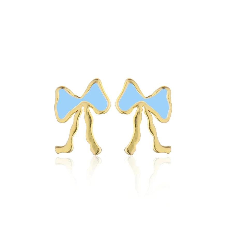 Jeberg Petite Bow Blue Stud Earrings shows a set of small bow earrings in gold with light blue detail. Model 52810-1