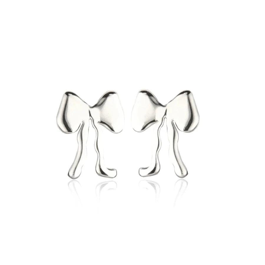 Jeberg Petite Bow Plain Stud in silver, elegant bow earrings in glossy finish on white background. Model 52822-1