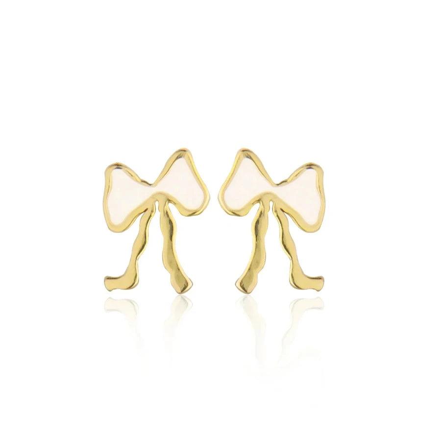 Jeberg Petite Bow White Stud Bow Earrings shows a pair of small gold and white colored bow earrings. Model 52815-1