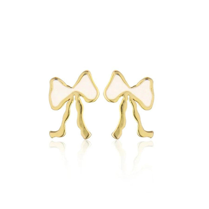 Jeberg Petite Bow White Stud Bow Earrings shows a pair of small gold and white colored bow earrings. Model 52815-1