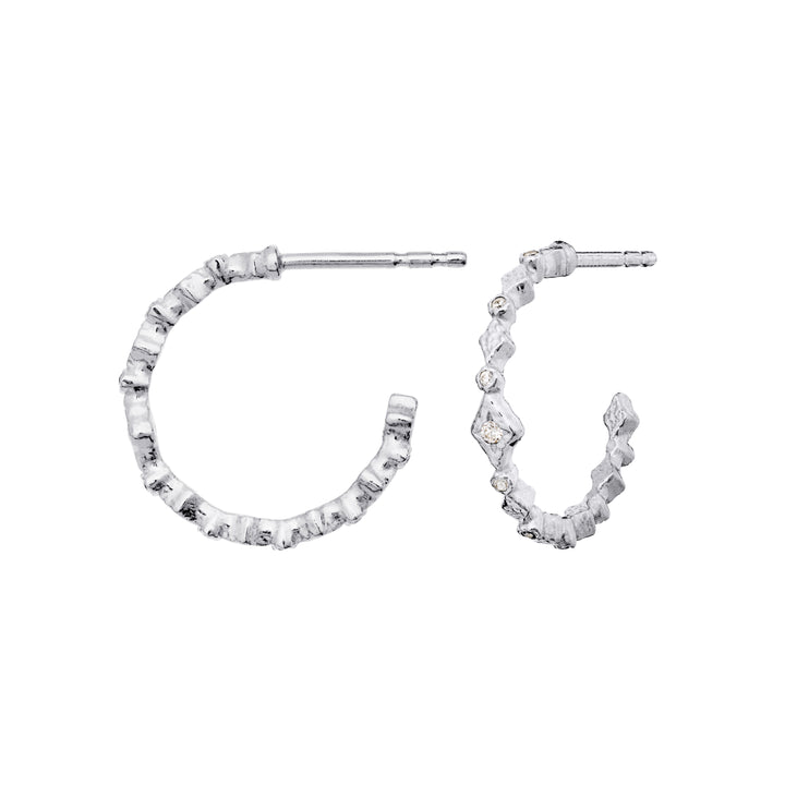 Maanesten Arlette silver hoops, asymmetric earrings in matt silver with raw structure and small stones, Model 10020c-2.