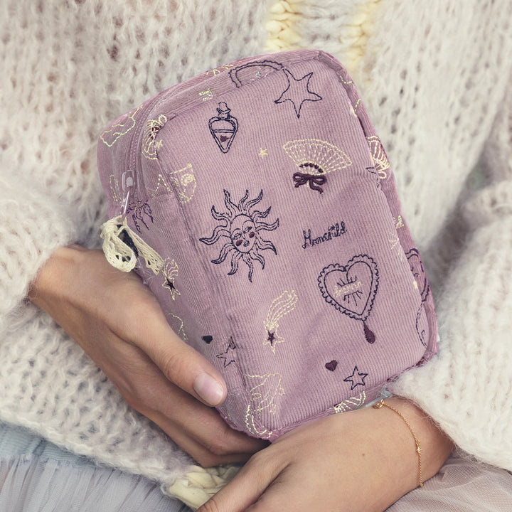 Maanesten Dreams Makeup Bag Magical Purple is held in hands, purple velor with embroidery. Model 4098-2
