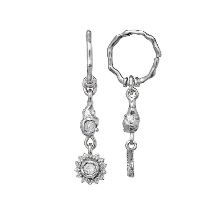Maanesten Ember silver earrings with raw organic shapes and various pendants in a shiny silver look. Model 9731c-9731c-2
