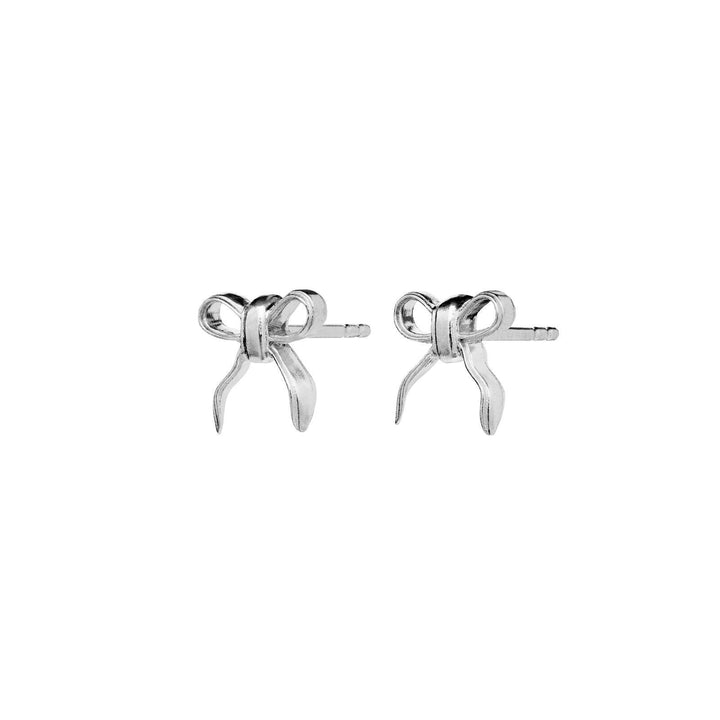 Maanesten Eunice silver bow earrings shown on white background, glossy finish. Model 9944C-2