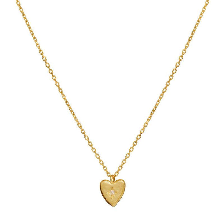 Maanesten Ira Necklace with heart pendant in shiny gold look, detail with small stone in the middle. Model 2707a-1