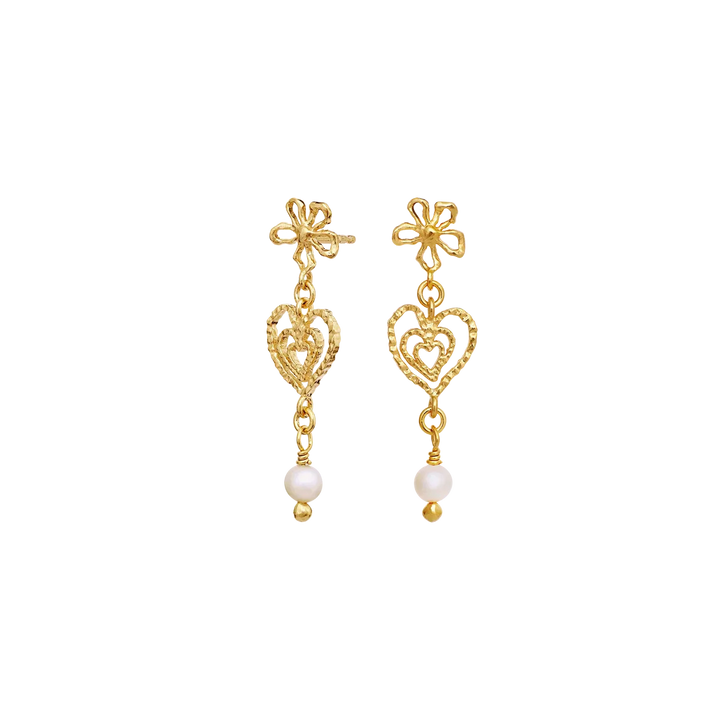 Maanesten Isabel Gold Plated Heart Earrings showcase two elegant gold plated studs with detailed heart pendants and pearl. Model 10097a