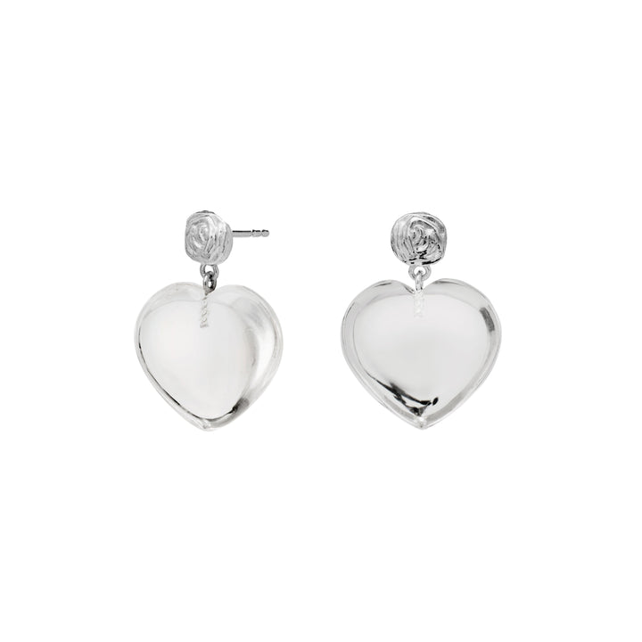 Moonstone Lemona Grande Silver Heart Earrings shows shiny, heart-shaped silver earrings on a white background. Model 9976C