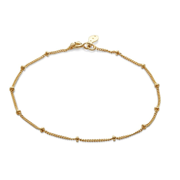 Maanesten Nala Bracelet 8012A shows a simple gold colored bracelet with small pearl details, Model 8012A-8012A-1.