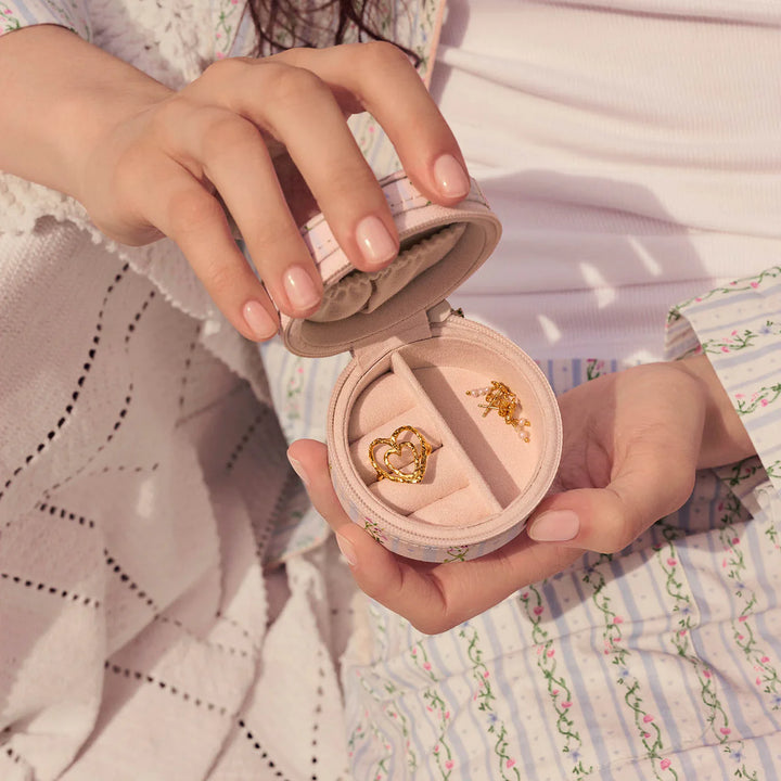 Maanesten Round Jewelry Box Small Garden Magic Ivory shown in hands, soft pink velvet, Model 4123-1.