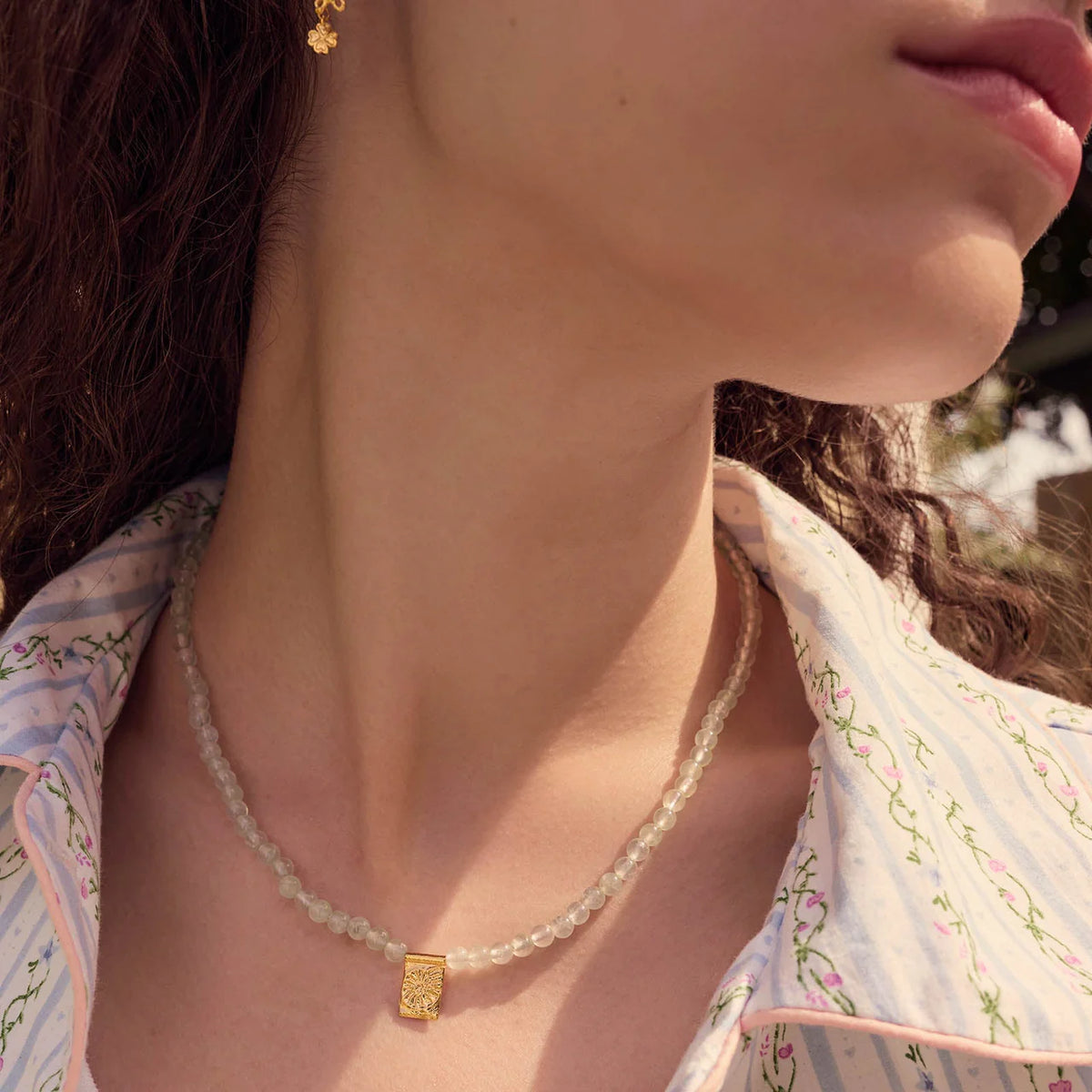 Moonstone Shelia necklace gold plated shown on neck, pearls with gold pendant, Model 2821a-1