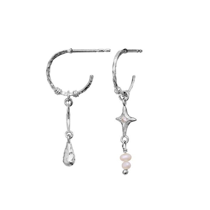 Maanesten Tamina silver earrings with asymmetrical design, drop pendant and star, Model 10022c.