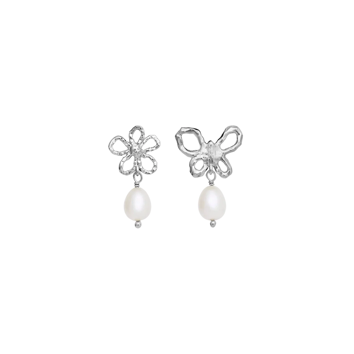 Maanesten Tonia silver earrings with pearls shown as a pair of different floral designs with white pearl pendants. Model 10114c-1.
