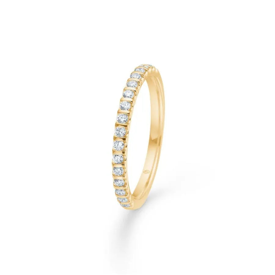 Mads Z 14kt Ophelia Ring 0.25ct W/SI shows a slim gold ring with sparkling diamonds. Model 1541525-001-1