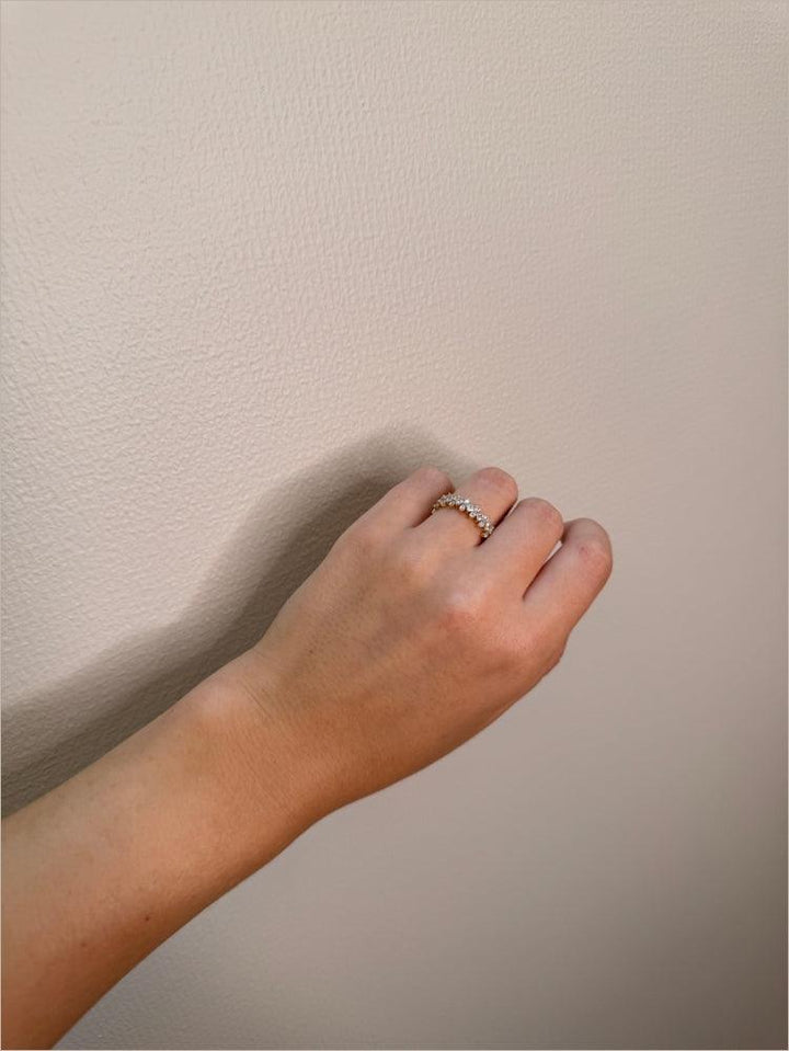 Mads Z 8kt Cassiopeia ring zirconia worn on hand, beautiful gold ring with clear stones, Model 3347008-001.