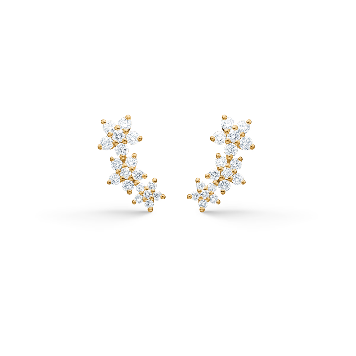 Mads Z Celeste Diamond Stud Earrings in 14kt gold features curved studs with flower-shaped diamonds. Model 1511142-1.