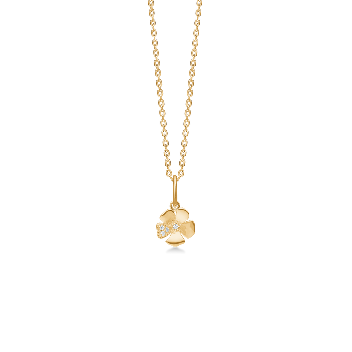 Mads Z Fleur 14kt gold pendant with diamonds 7mm is seen as a flower-shaped pendant with diamonds in bright gold. Model 1531111-1