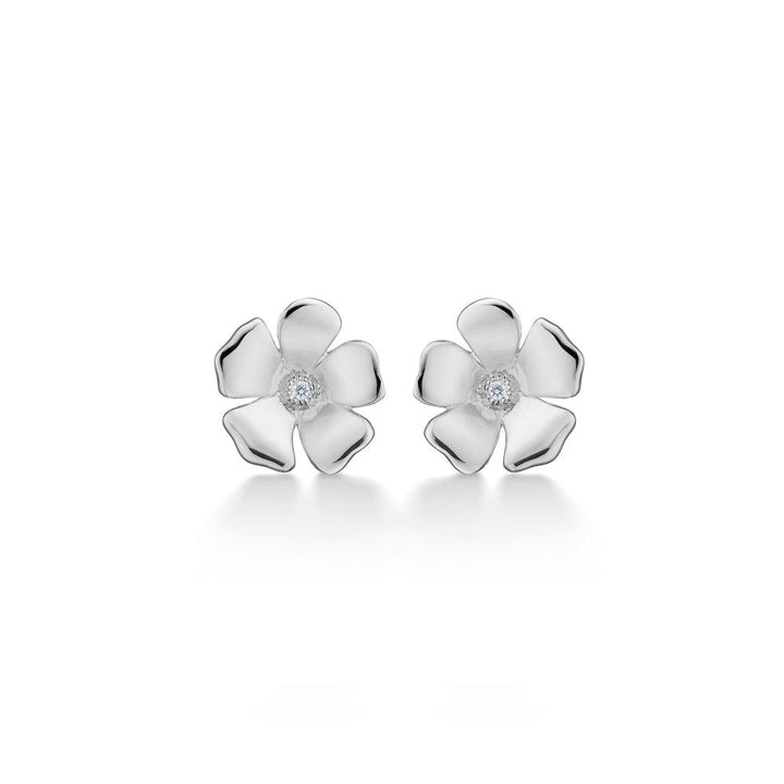Mads Z Fleur silver earrings with white topaz show flower-shaped earrings in shiny silver. Model 2116106-1