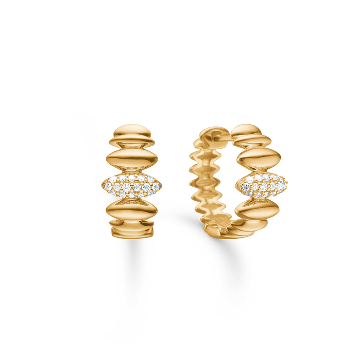 Mads Z Orielle 14kt creole 0.10ct w si shows a set of golden earrings with round details and small clear stones. Model 1511020-1