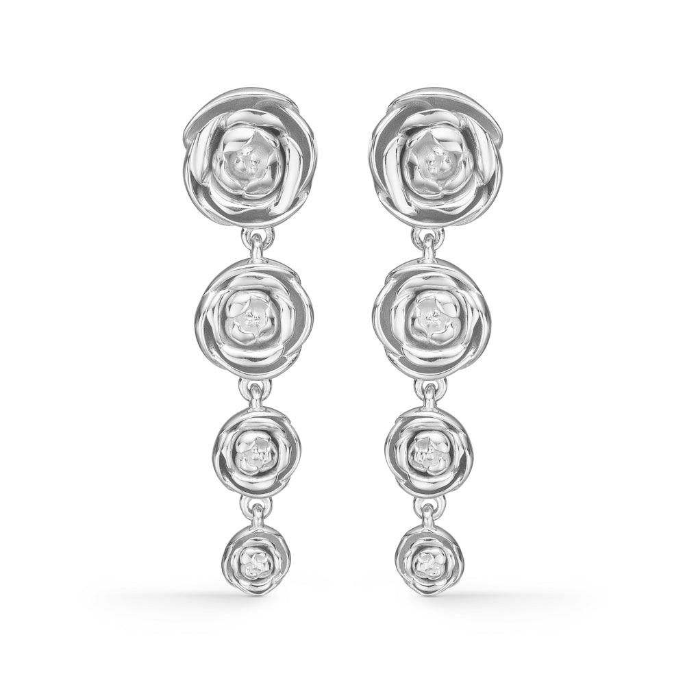 Mads Z Silver Rosalie earrings in shiny silver with three rose silhouettes. Model 2110159-1.
