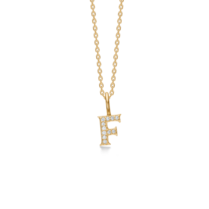 Mads Z Tender Love bogstavs 14kt guld vedhæng med diamanter viser F-vedhæng i guld med små klare diamanter. Model 1531100-006-7