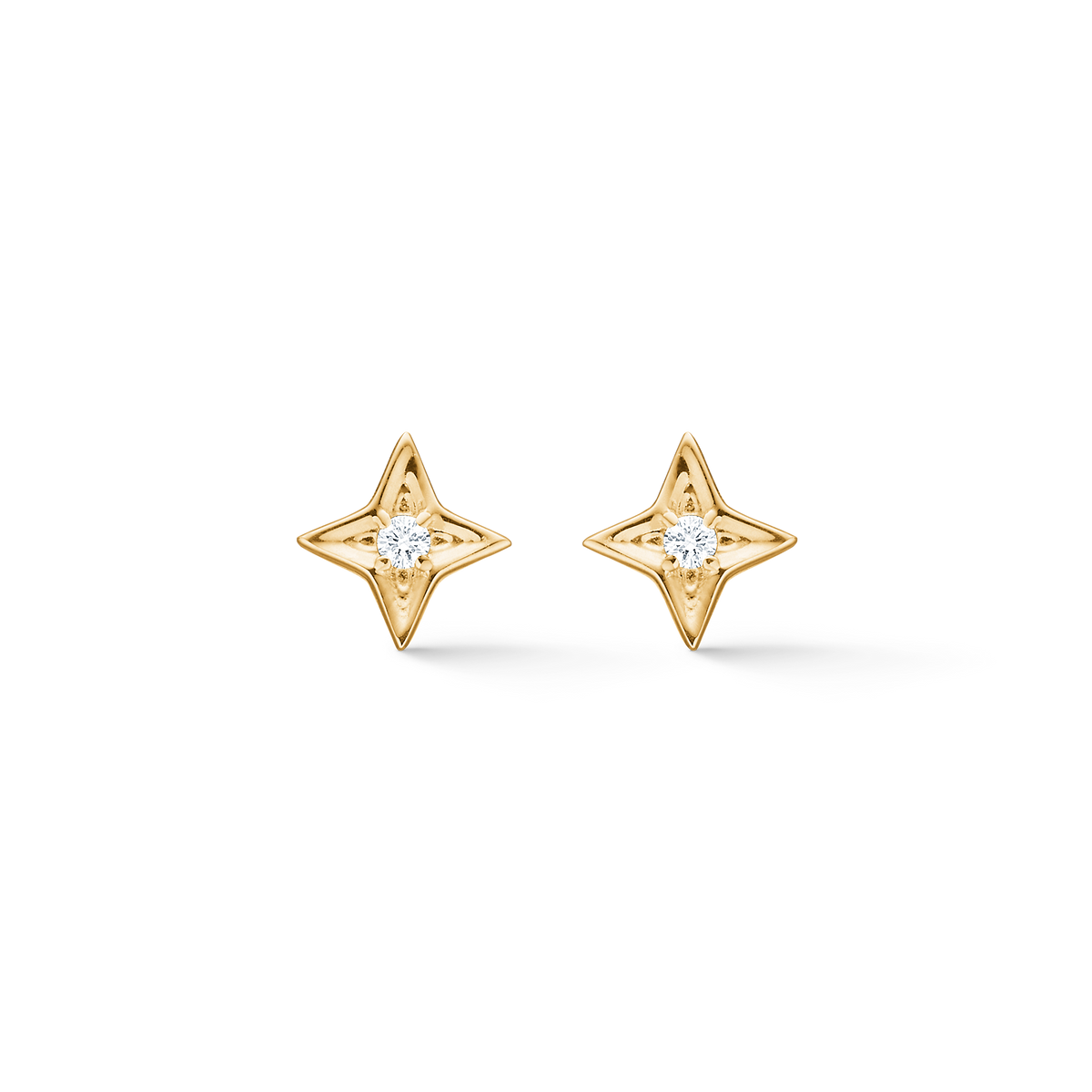 Mads Z Vesper 14kt gold stud earrings feature a star-shaped design with a clear diamond in the center. Model 1511197-1