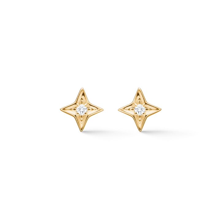 Mads Z Vesper 14kt gold stud earrings feature a star-shaped design with a clear diamond in the center. Model 1511197-1